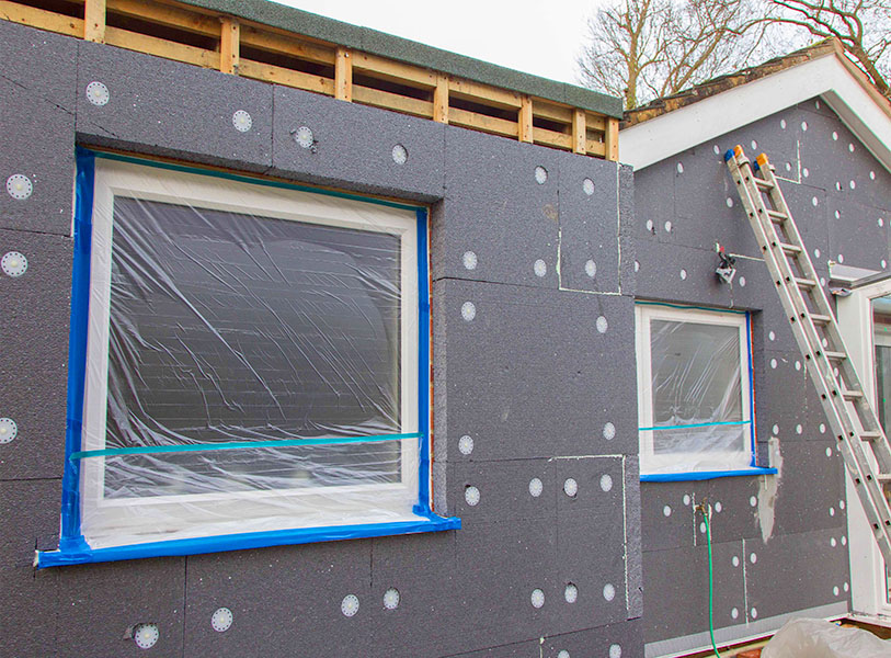 EWI installed prior to external rendering EPS expanded polystyrene